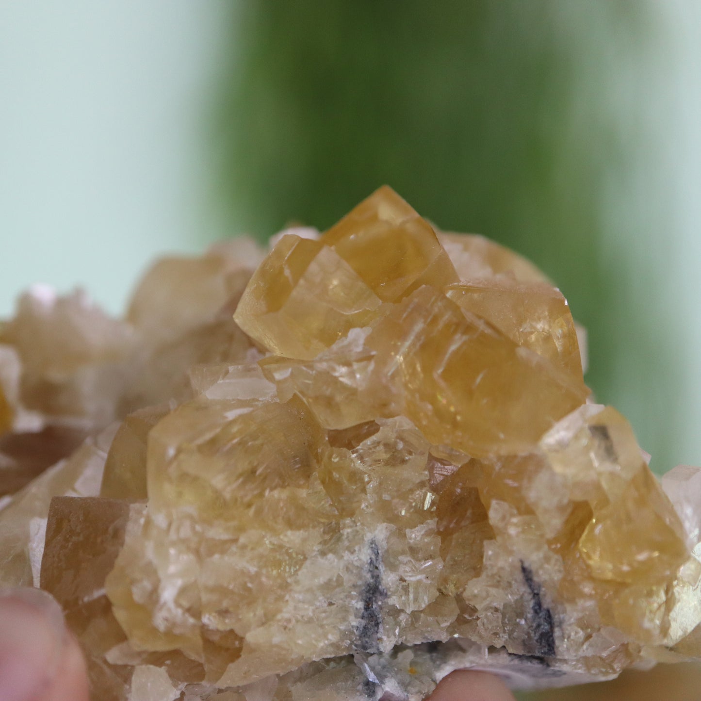 Honey calcite cluster UV