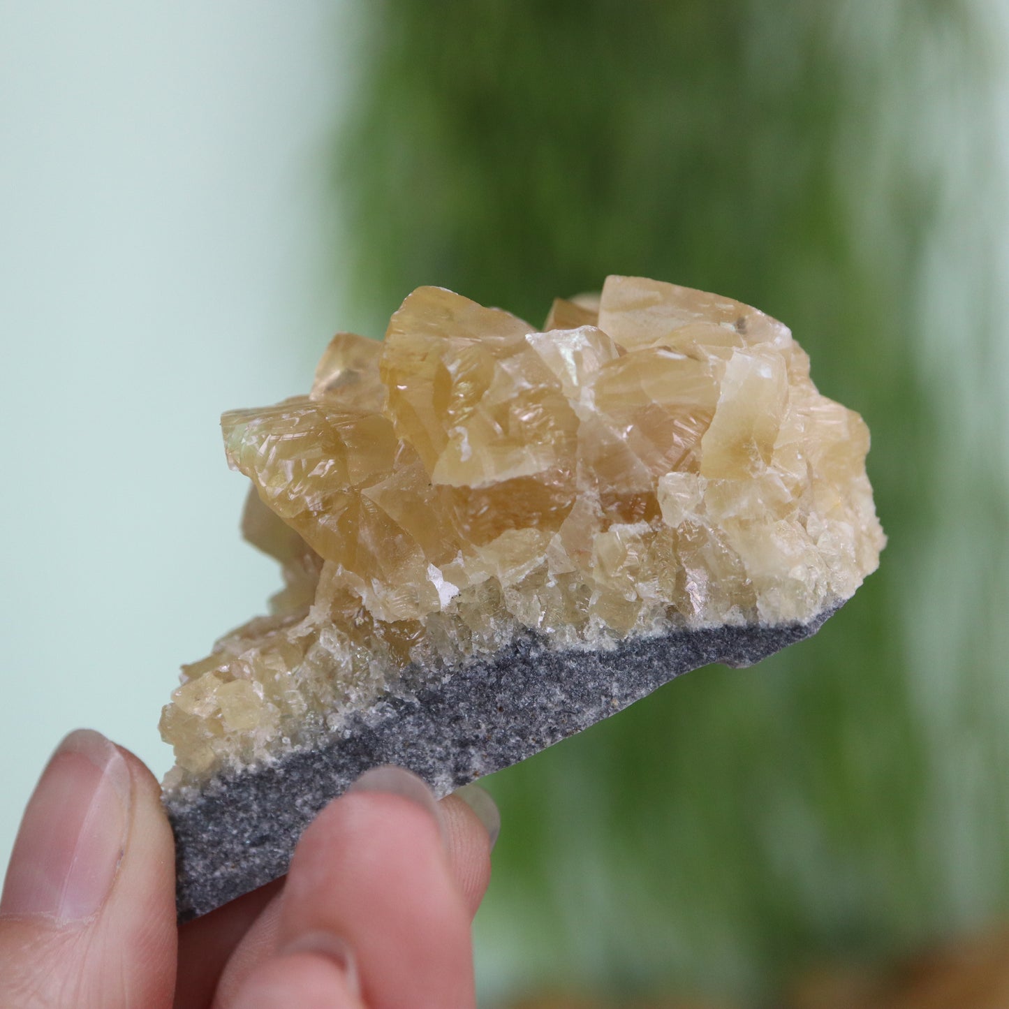 Honey calcite cluster UV