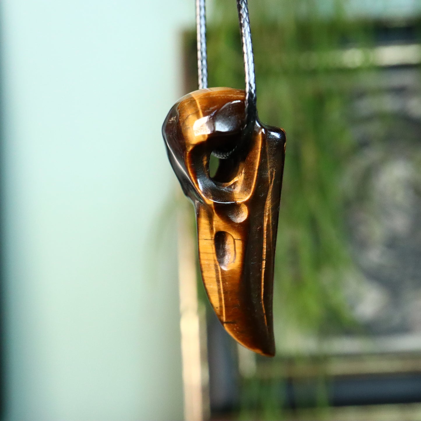 raven schedel / hanger Tijgeroog
