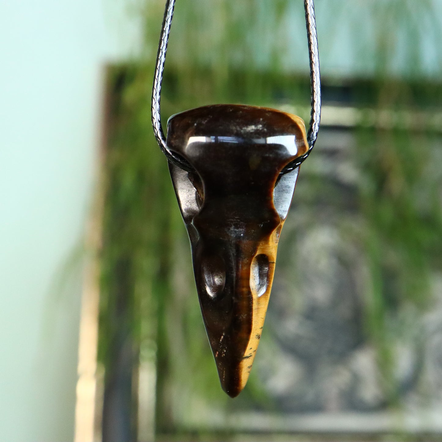 raven schedel / hanger Tijgeroog