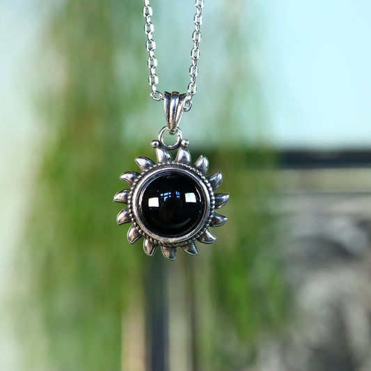 Obsidiaan zon verzilverd met ketting