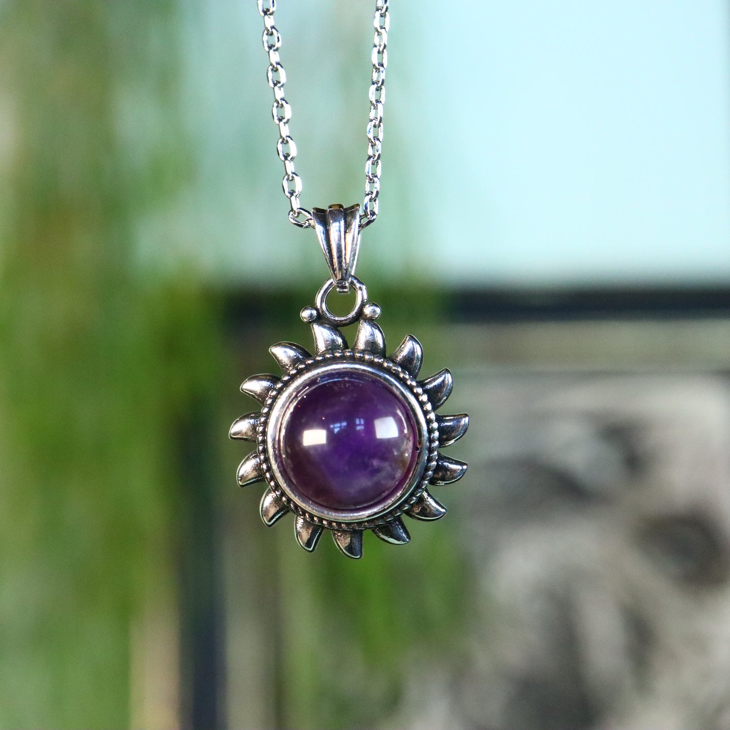 Amethist zon verzilverd met ketting