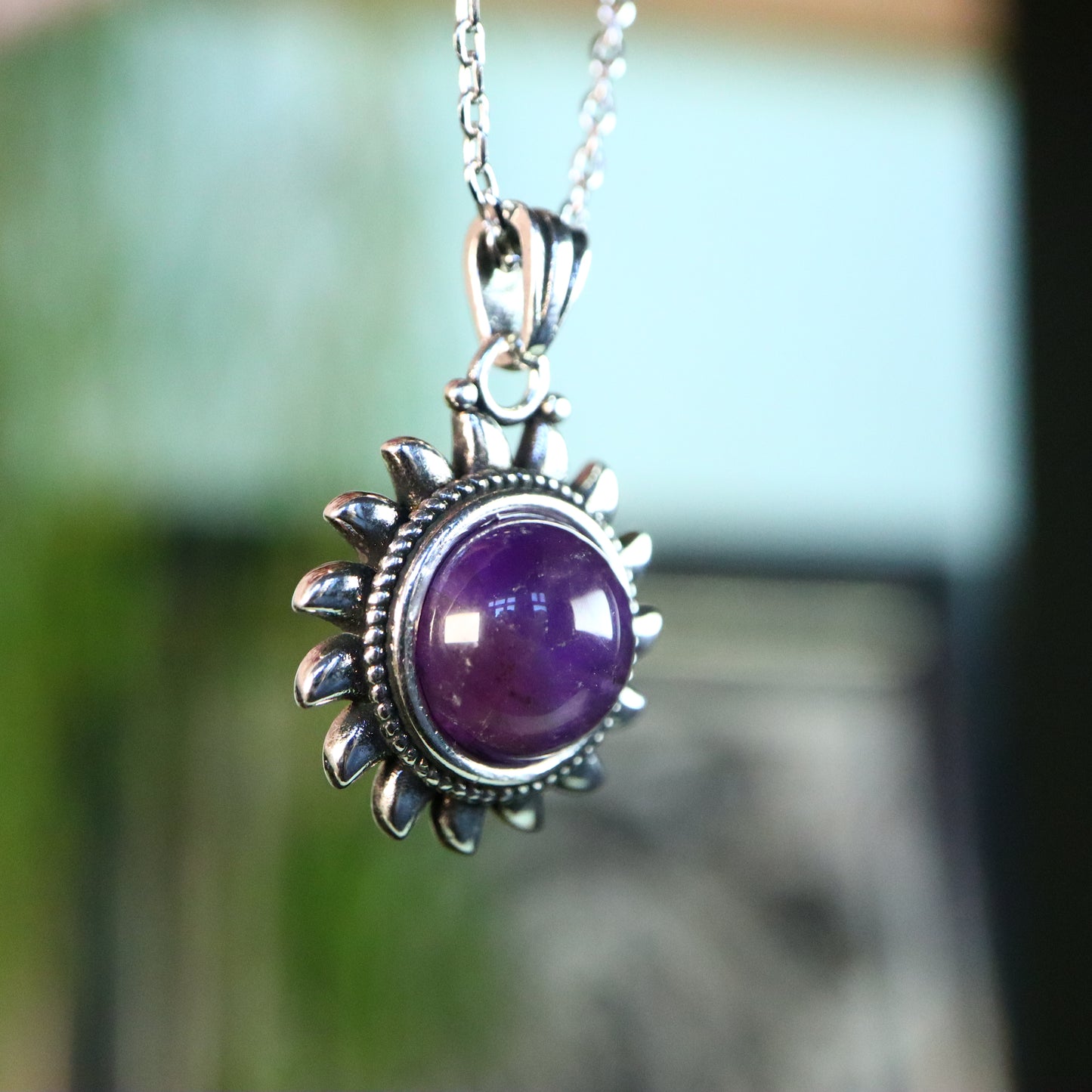 Amethist zon verzilverd met ketting